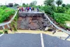 Continuous rainfall causes road diversions to wash away, uproots trees, and damages houses in Jharkhand