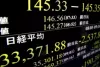 Japan’s benchmark Nikkei 225 index soars more than 10% after plunging a day earlier