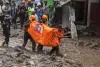 Rescuers recover 20 bodies from flash floods and landslides on Indonesia's Sumatra island