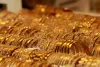 Gold futures rise on spot demand