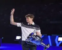 Sinner is awarded the trophy for finishing the year at No. 1 in the ATP rankings