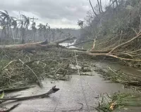 Latest typhoon lashes Philippines, causing tidal surges, displacing massive numbers of people