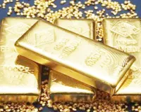 Gold futures rise on spot demand