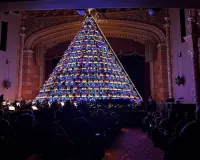 Michigan high school choir belts out holiday tunes from towering Christmas tree