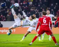 Freiburg survives late onslaught to beat Wolfsburg in Bundesliga thriller