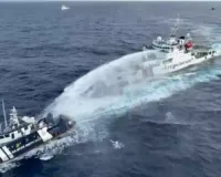 Philippines says China's coast guard blasts water cannon and sideswipes patrol vessel