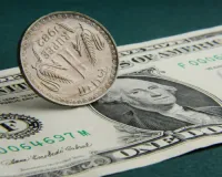 Rupee settles 19 paise higher at 87.00 against US dollar