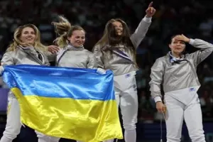 Ukraine wins its first gold medal of the Paris Olympics in women’s team saber fencing 