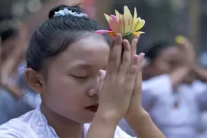 In Bali, young girls dance in traditional Hindu festival threatened by changing times