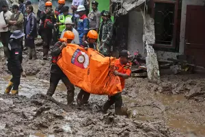 Rescuers recover 20 bodies from flash floods and landslides on Indonesia's Sumatra island