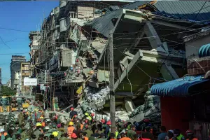 Tanzanian govt says rescue efforts will continue at collapsed building where 13 died