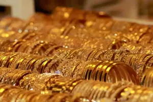 Gold futures rise on spot demand