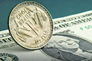 Rupee stays flat at 84.68 against US dollar in early trade