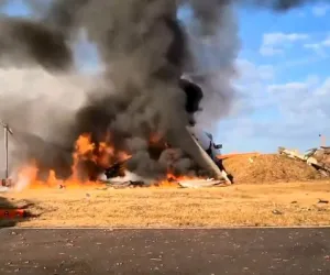 Plane bursts into flames after skidding off runway at airport in South Korea, killing 96 people